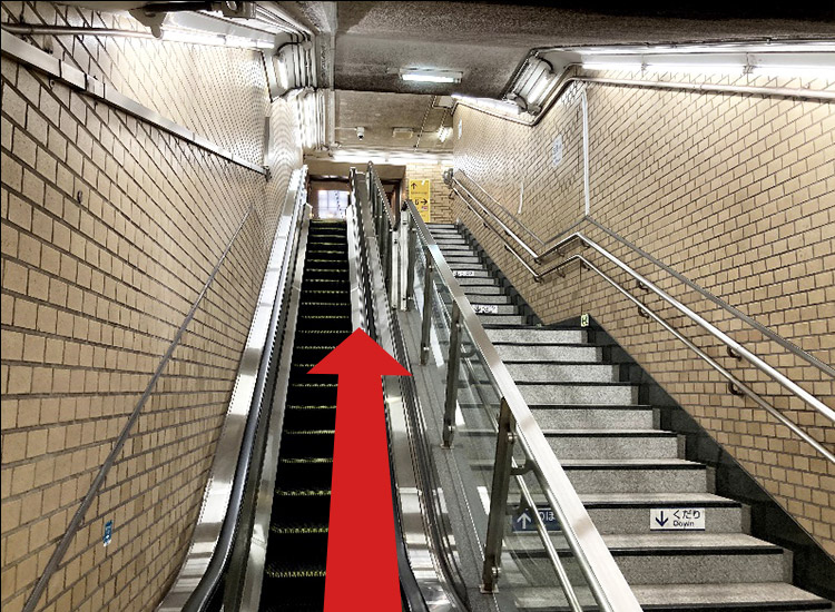 You will get to the staircase or escalator landing.