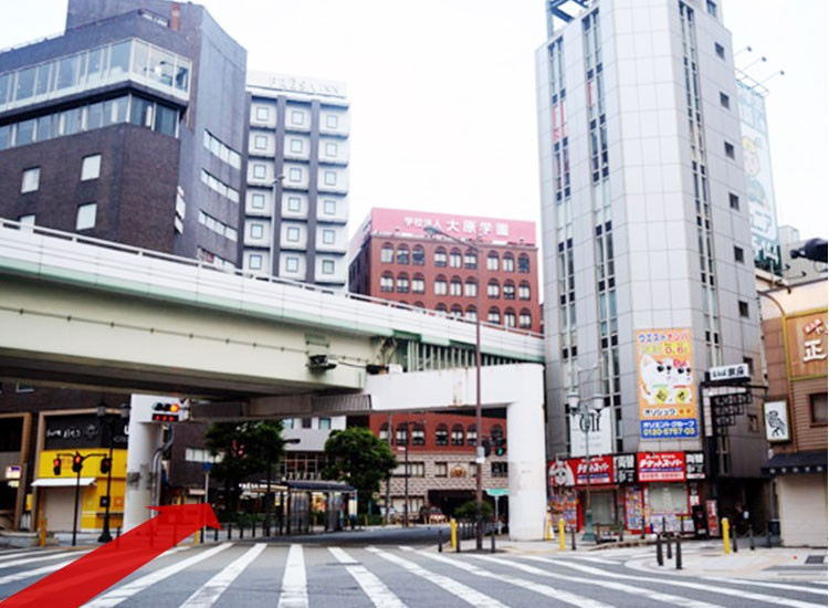 Go outside and turn left, then cross the Namba West Exit intersection.