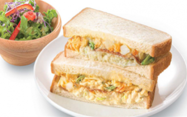 House-made Egg Salad Sandwich with a drink