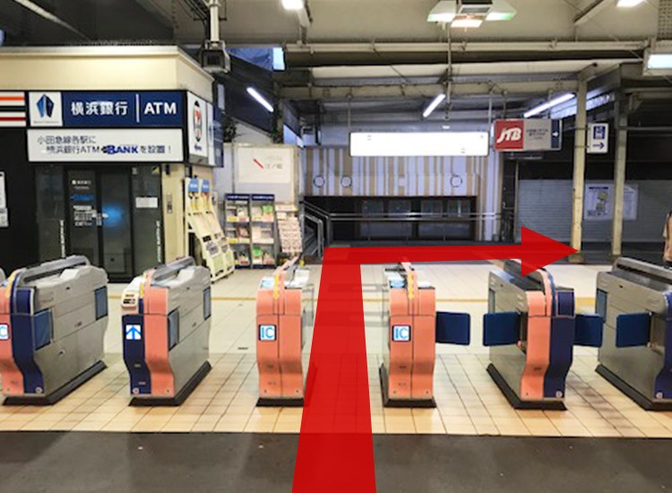 Go out the Odakyu Line ticket gate and walk to the right direction.