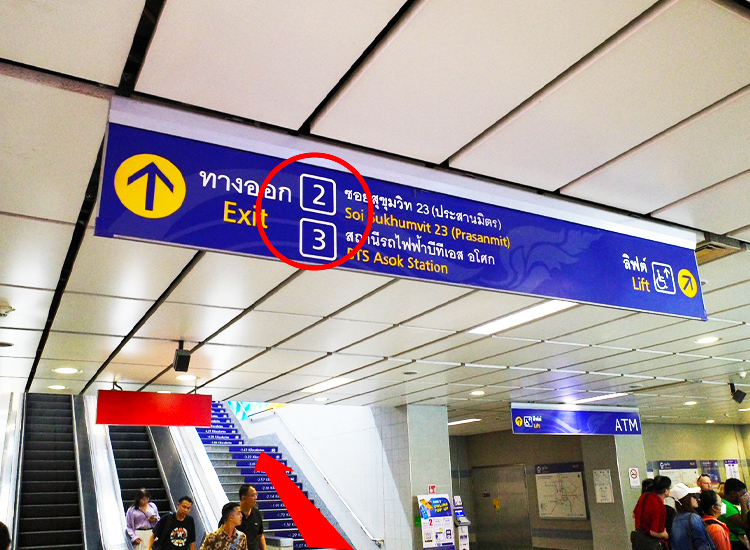 After arriving at Sukhumvit MRT station, exit the station through the gate towards Exit 2 or 3.