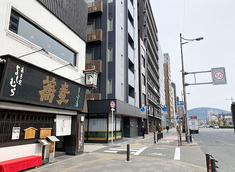 Our hotel is located across the side street of the soba shop.